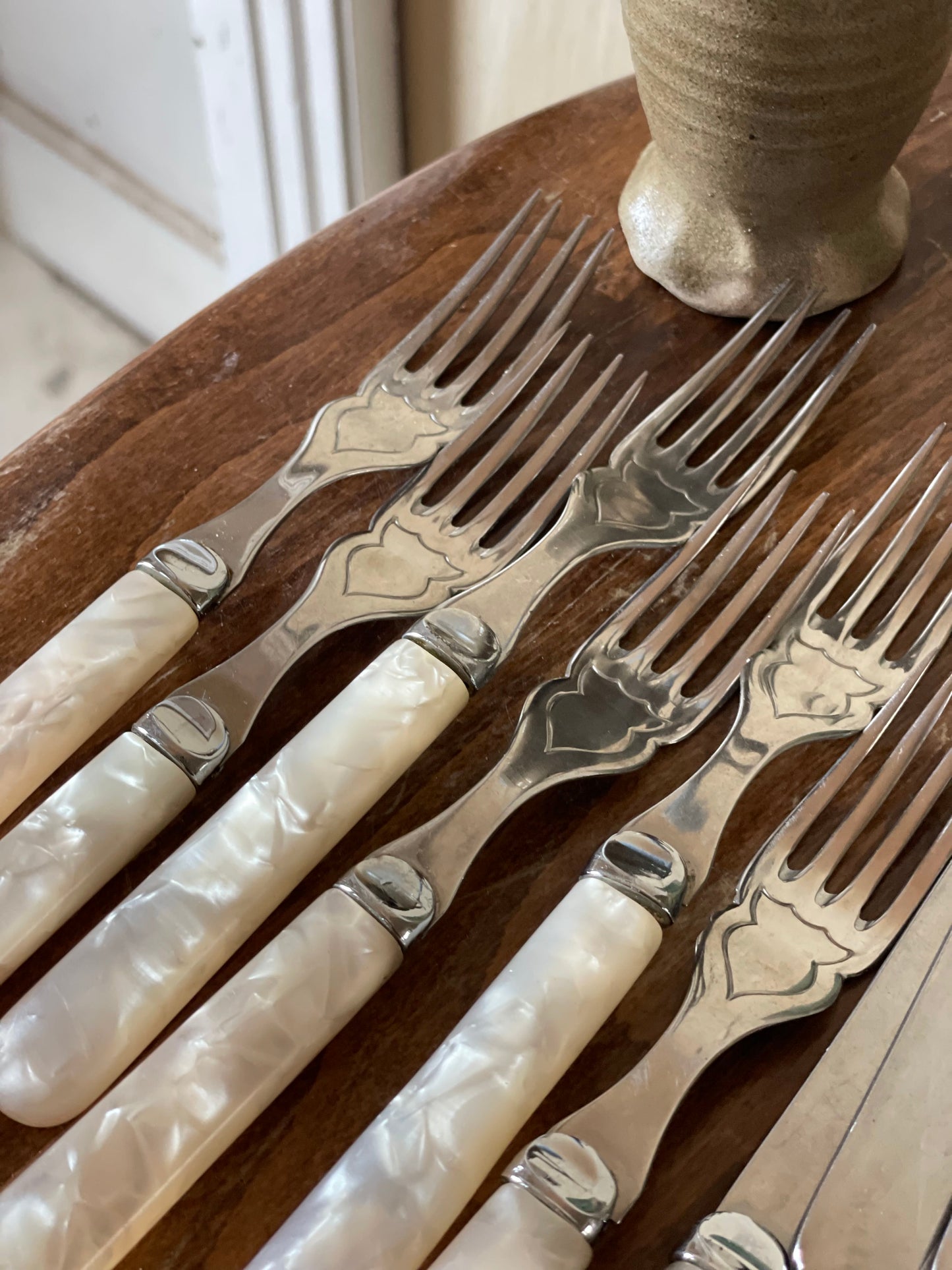 Set tacâmuri argintate cu mâner din sidef